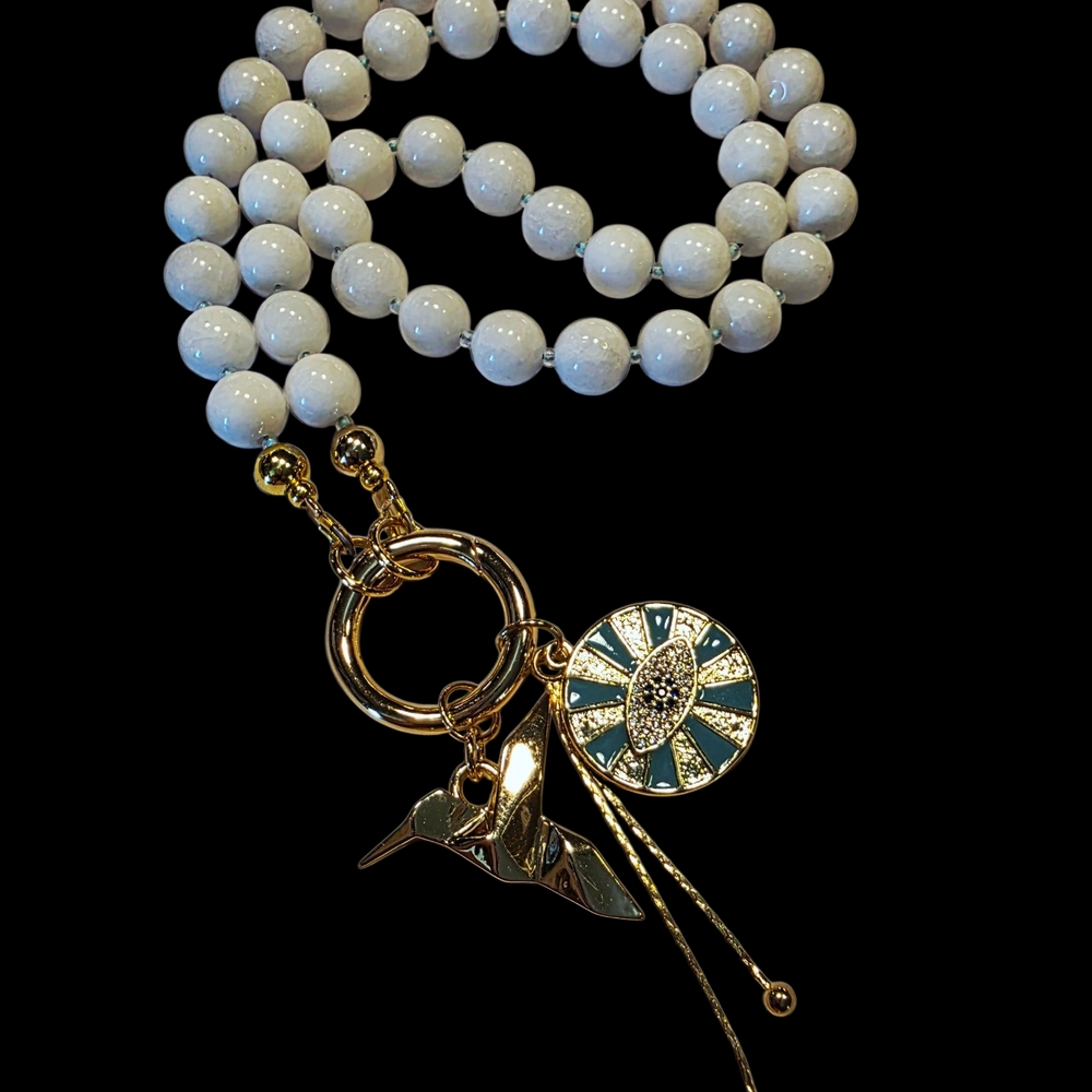 SALE !! Elegant White Beaded Necklace with Gold Charms And Gate